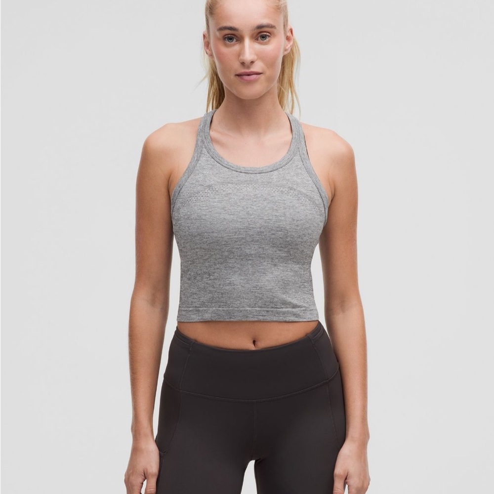 Brand Lululemon cropped swiftly tank 

Size 4
Color: slate/white